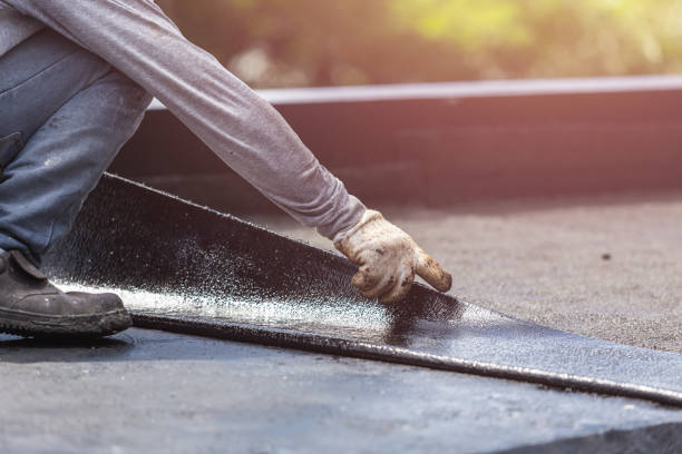 Professional Basement Waterproofing technician working in Wheaton, MN